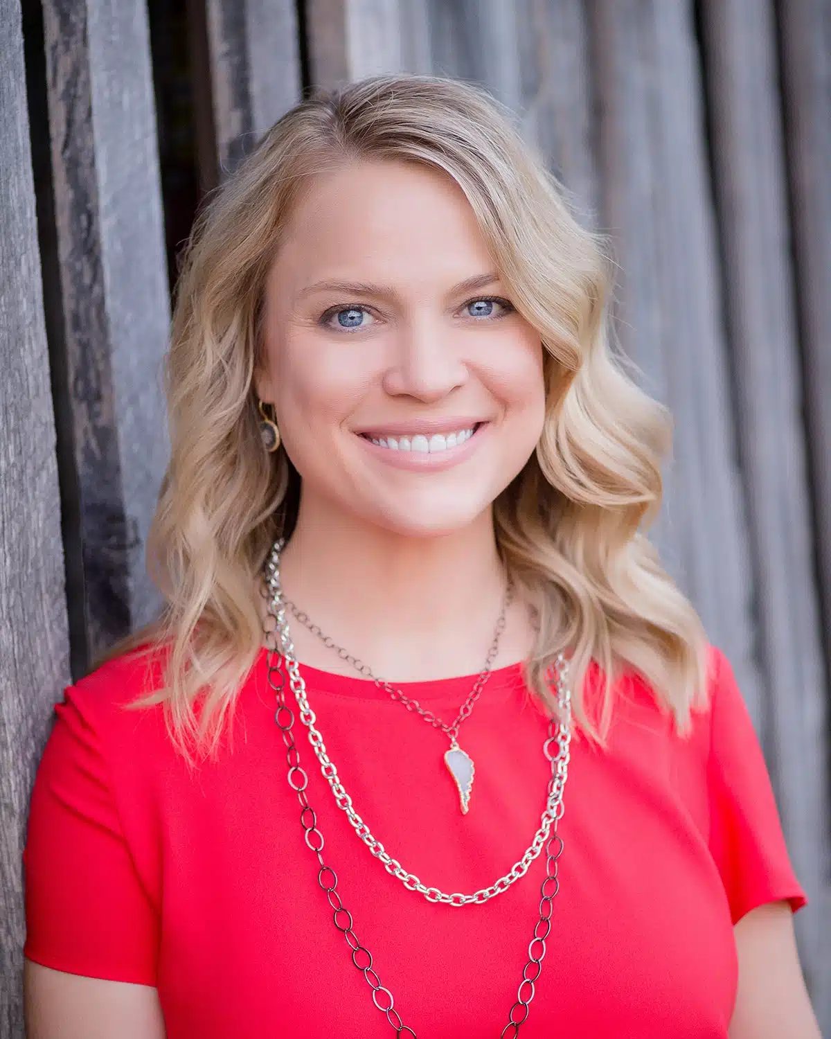 a woman wearing a red shirt