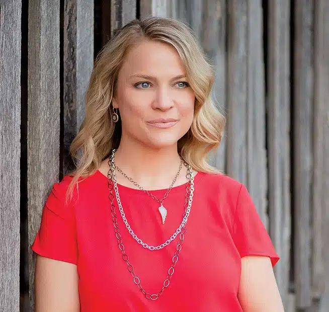 a woman wearing a red shirt